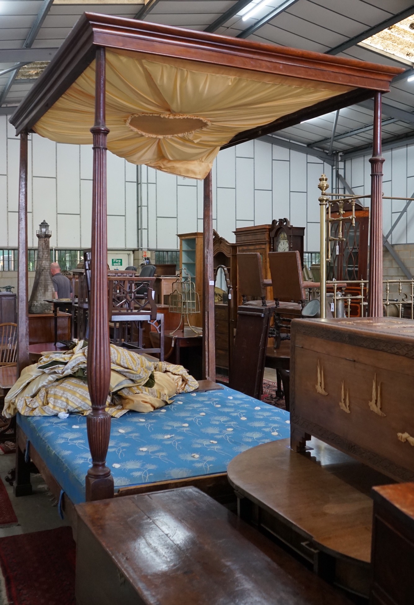 A George III mahogany four poster bed, length 204cm, depth 156cm, height 250cm